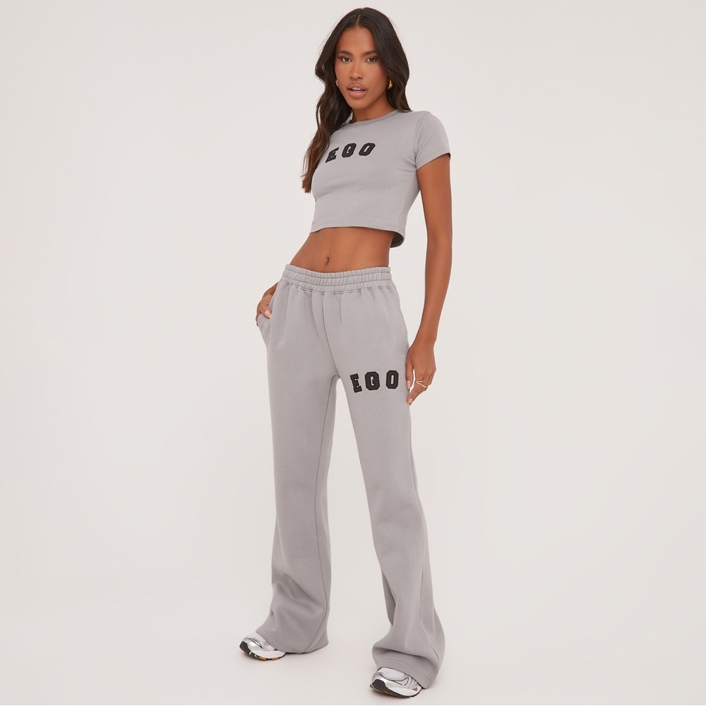 EGO HIGH WAIST EGO GRAPHIC SLOGAN WIDE LEG SLOUCHY JOGGERS IN GREY
